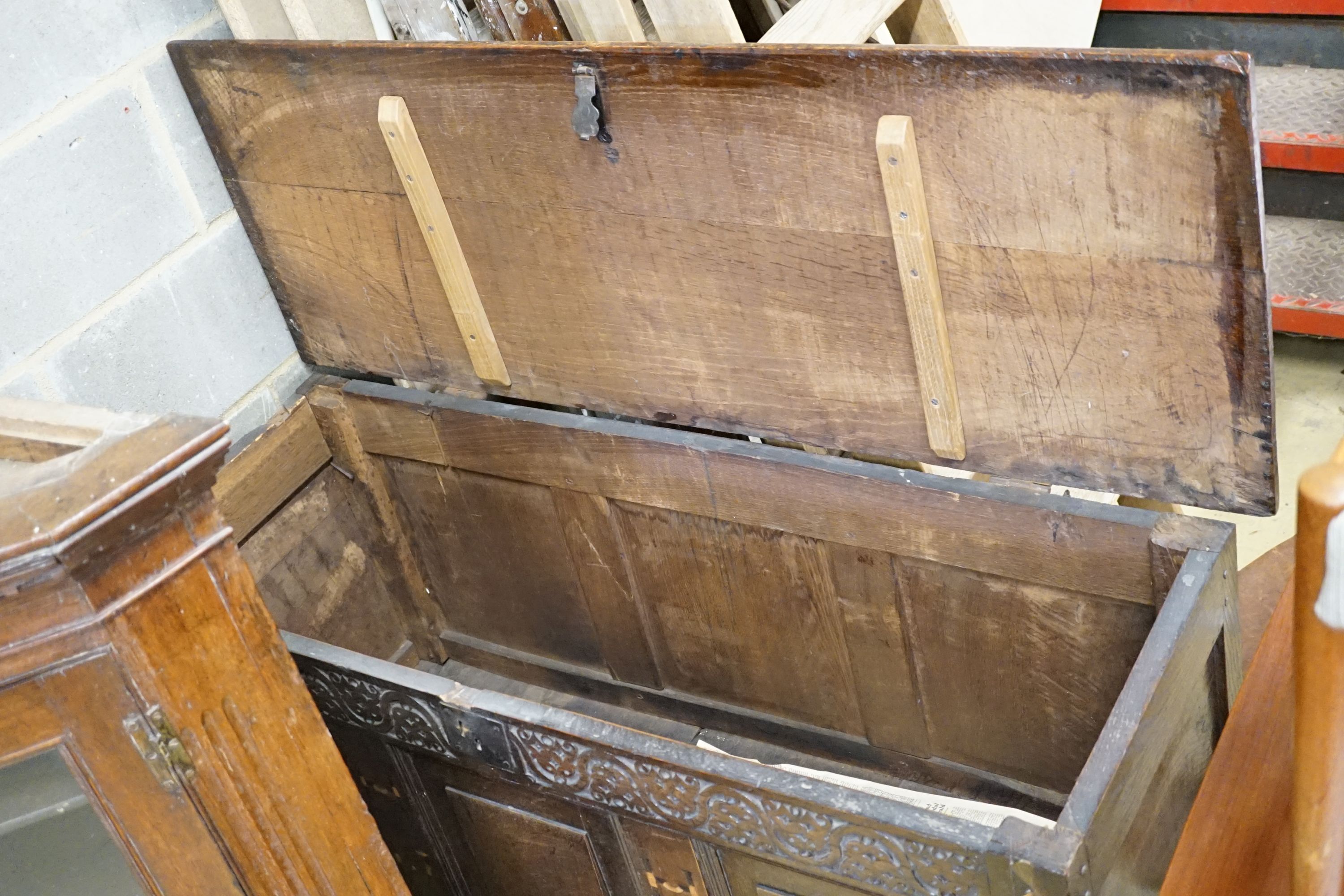 An early 18th century oak coffer, dated 1701, length 127cm, depth 48cm, height 71cm